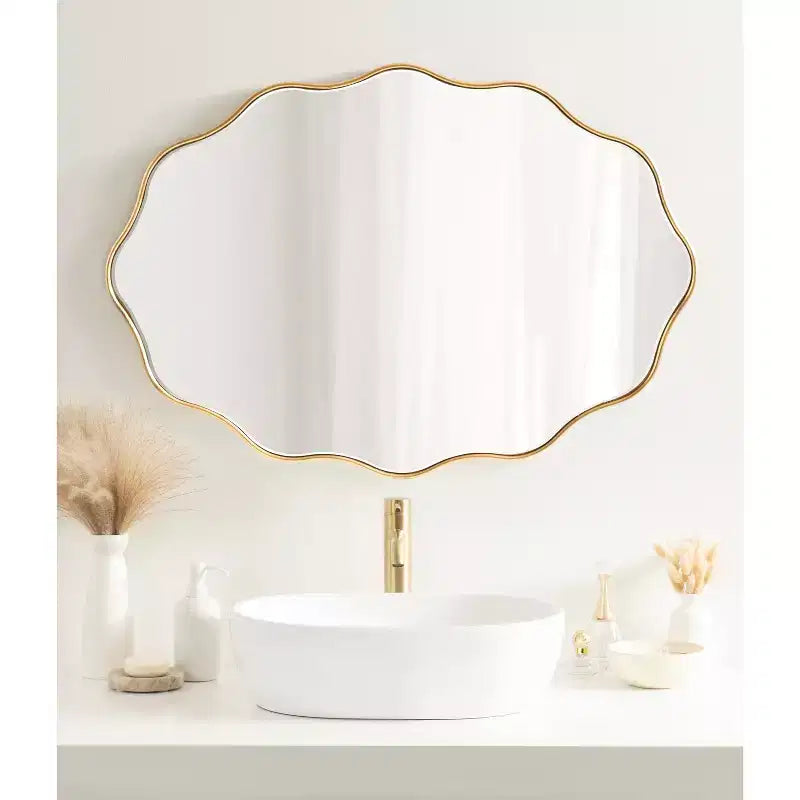 Miroir ovale en éventail, doré