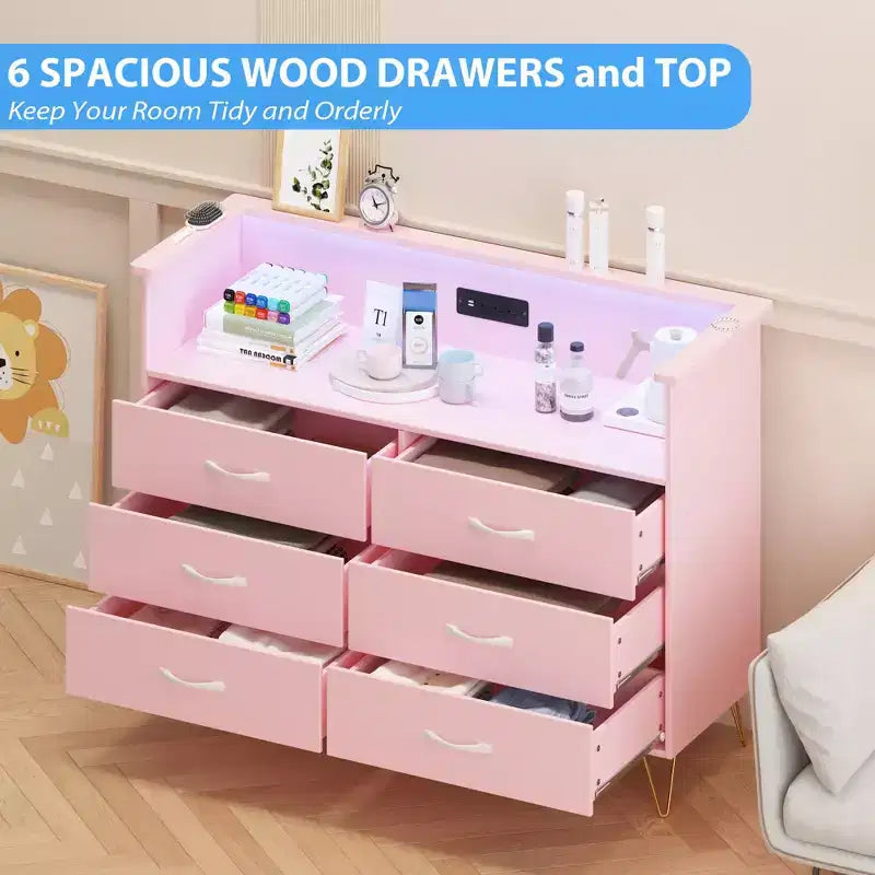 Commode rose à six tiroirs en bois